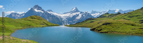 idyllic alpine lake Bachalpsee, tourist destination near Grindelwald, beautiful landscape switzerland