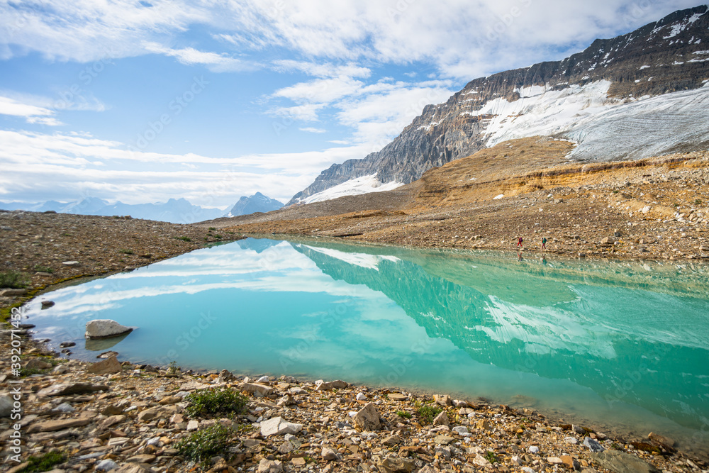 Perfect Reflections in Beautiful Emerald Coloured Alpine Lake Perfect Reflections in Beautiful Emerald Coloured Alpine Lake