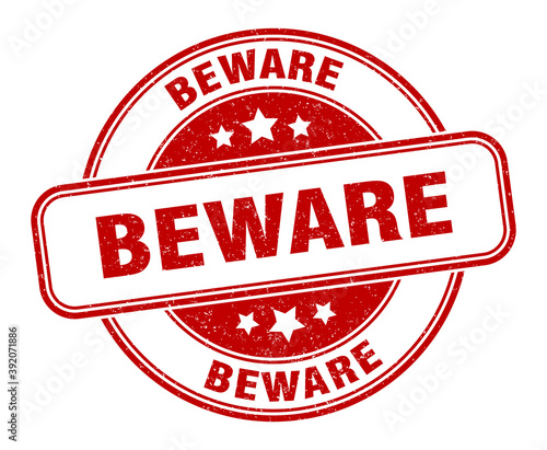 beware stamp. beware label. round grunge sign