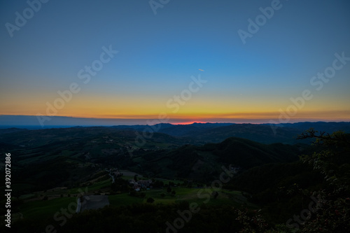 Colorful morning sky before sunrise in the mountains. Natural background. Camping, travel, trekking concept