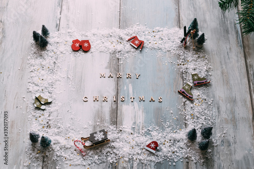 Christmas decoration on rustic wooden background with Marry Christmas text, high angle view