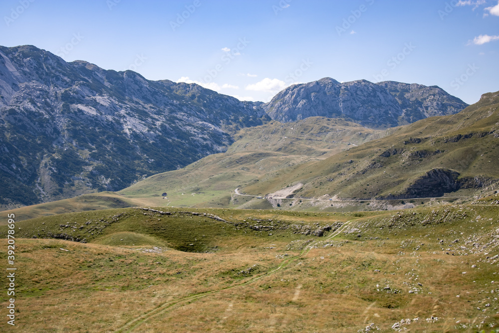 Fototapeta premium Fantastic mountains of Montenegro. Panoramic road. Picturesque mountain landscape of Durmitor National Park, Montenegro, Europe, Balkans, Dinaric Alps, UNESCO World Heritage Site.