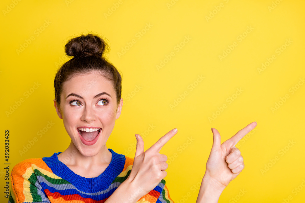 Photo of attractive person direct fingers empty space promo open mouth isolated on bright yellow color background Photo of attractive person direct fingers empty space promo open mouth isolated on bright yellow color background