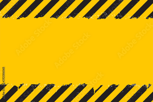 Yellow background with black grunge hazard sign