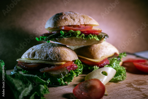 Delicious sandwiches. Three fresh square sandwiches on the table