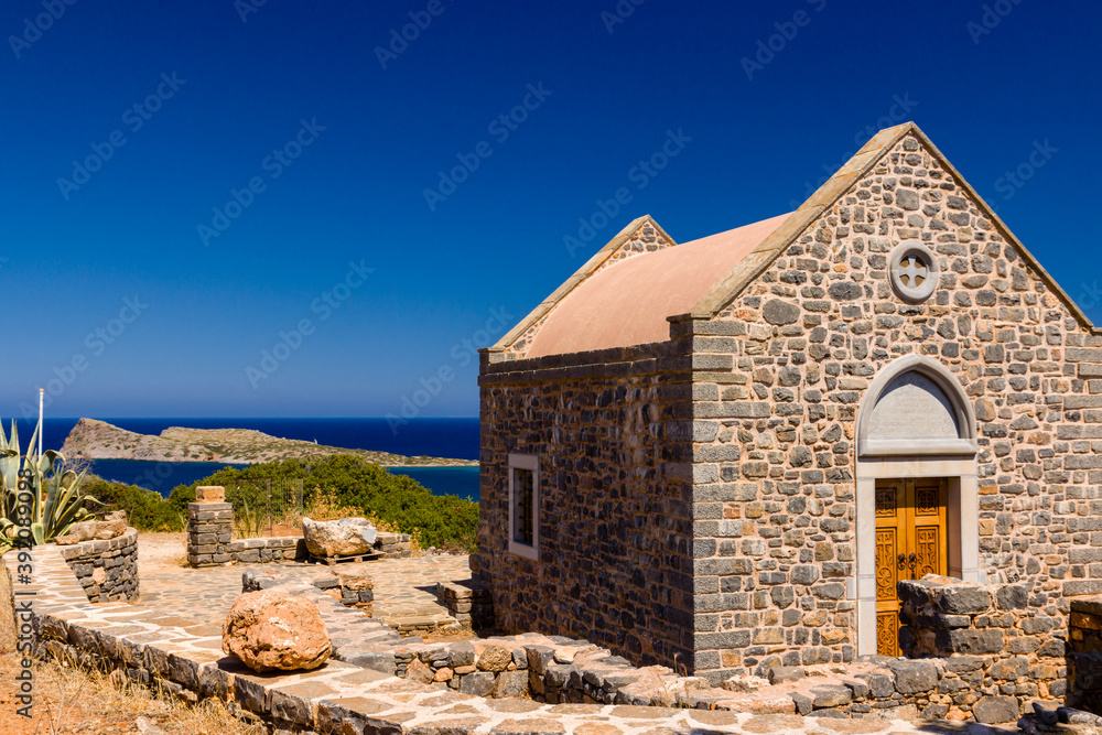 Beautiful Greek church next to the ocean