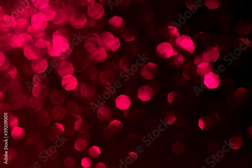 Abstract bokeh dark red with light background.Red,maroon x mas color night light elegance,smooth backdrop,artwork design for new year,Christmas sparkling glittering or special day.Soft focus.