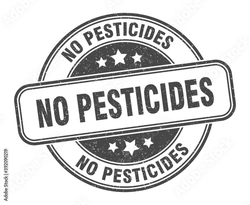 no pesticides stamp. no pesticides label. round grunge sign