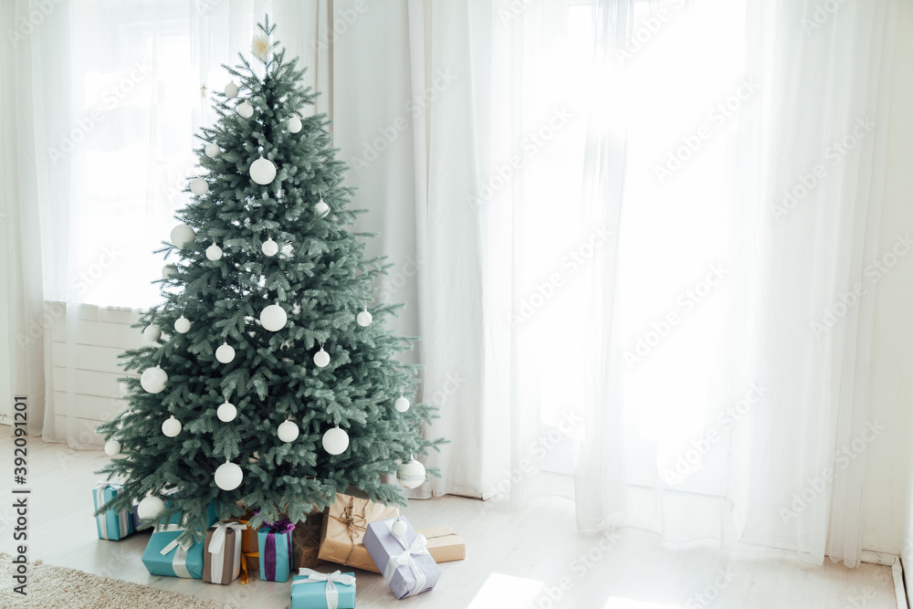 New Year's card interior with window and Christmas tree with gifts New Year's card interior with window and Christmas tree with gifts