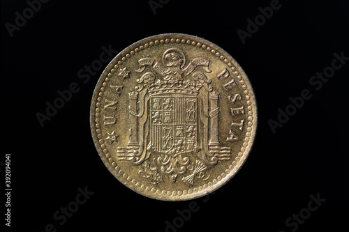 Old Peseta coin with the coat of arms of Franco's Spain formed by the eagle of San Juan photo