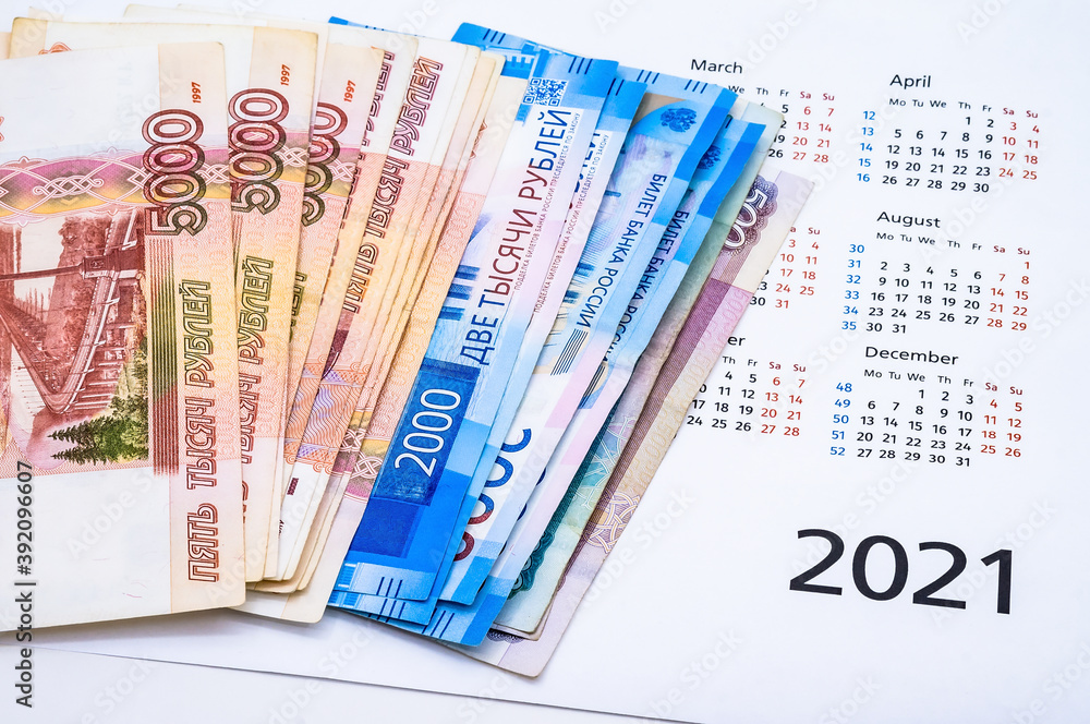 Calendar and Money. Ruble bills and calendar. Calendar and Money. Ruble bills and calendar.