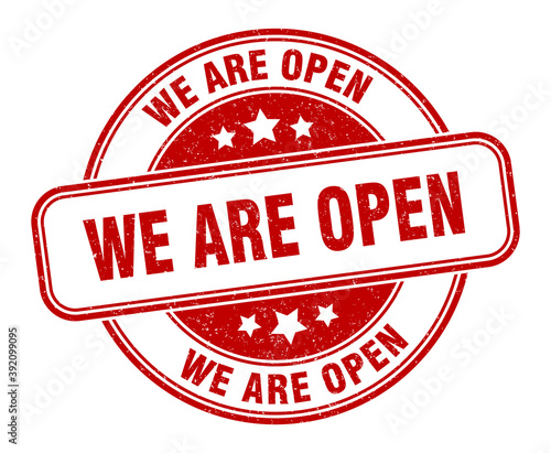 we are open stamp. we are open label. round grunge sign