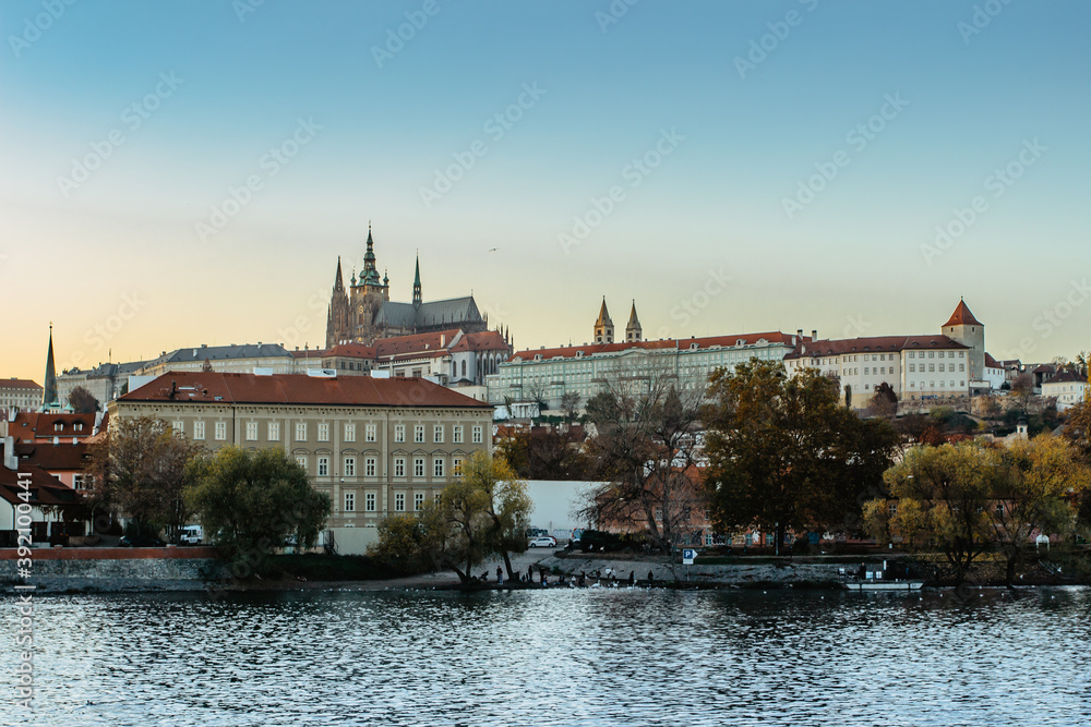 Scenic panorama of Prague Castle,Saint Vitus cathedral and Vltava river.Capital of the Czech republic.Amazing European cityscape.Prague at colorful sunset.Famous tourist destination