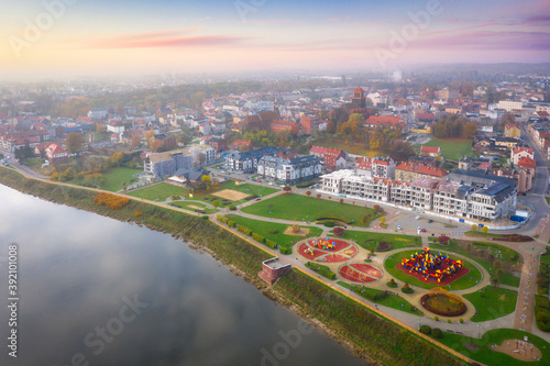 Aerial landscape of misty Tczew city and the Vistula river, Poland.