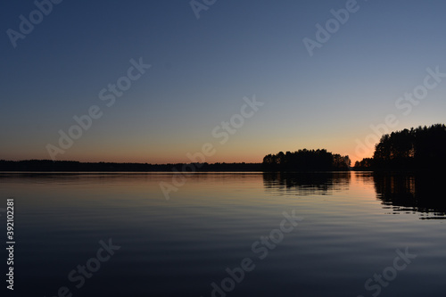 red sunset on the lake © loginov_photo_