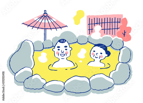 温泉に浸かるシニア夫婦