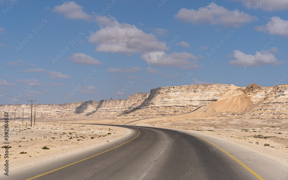Desert road through the Dhofar Mountains in Oman Desert road through the Dhofar Mountains in Oman