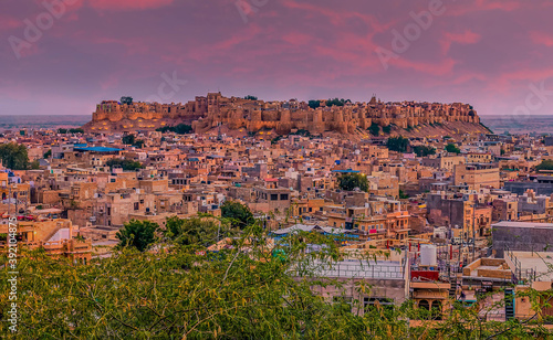 The old cliff top city of Jaisalmer illuminated in the night sky in Rajasthan, India © Nicola