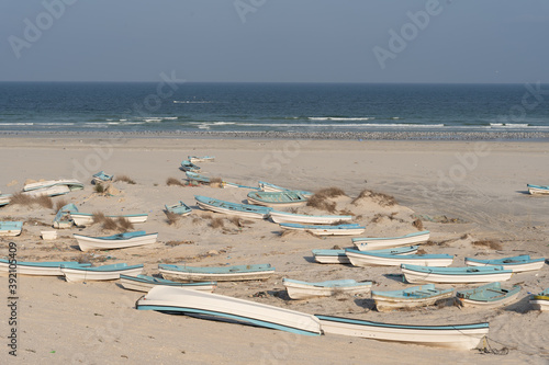 Wooden Fishing boats on the beach of Ras Madrakah in   Oman