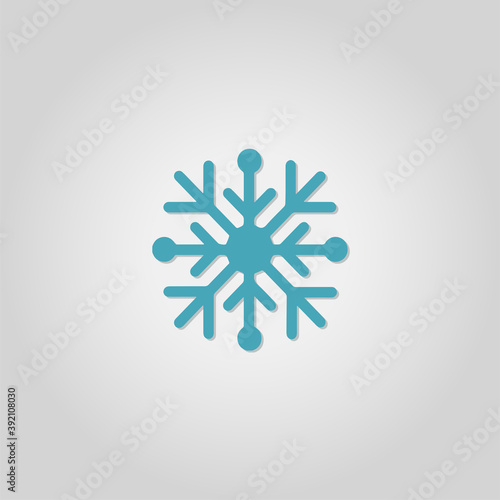 Blue snowflake silhouette on gray background. New Year and winter symbol. Vec...