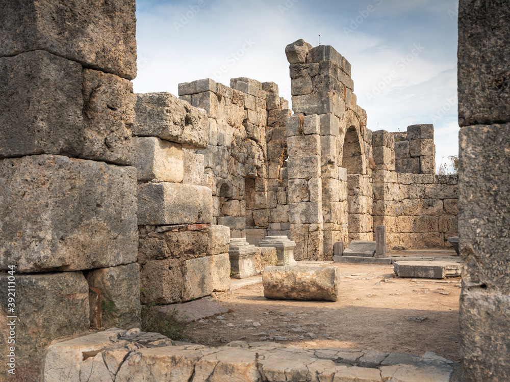 view to old ruins of antique basilica through door enter
