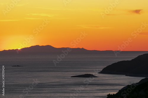 gorgeous sunset above the Adreatic coast with view to the Croatian island of Korcula
