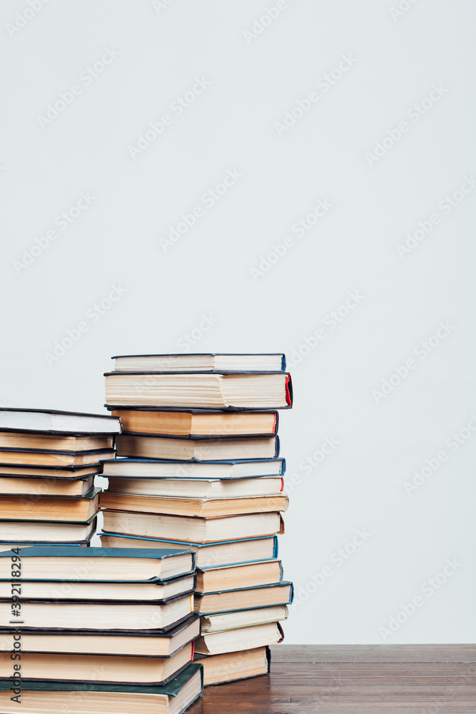 stacks of books for reading and education on a white background in the library stacks of books for reading and education on a white background in the library