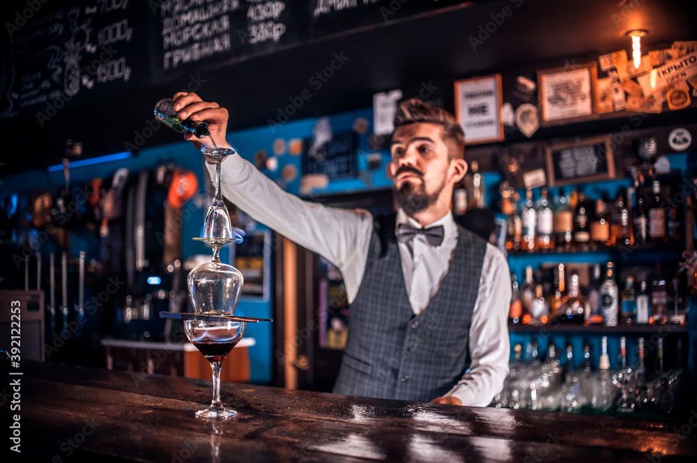 Barman mixes a cocktail on the beerhall