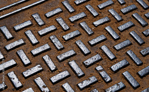 Manhole cover texture detail, Tiradentes, Brazil 