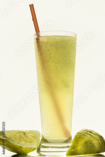 Verttical closeup shot of a Lime flavored refreshing drink photo