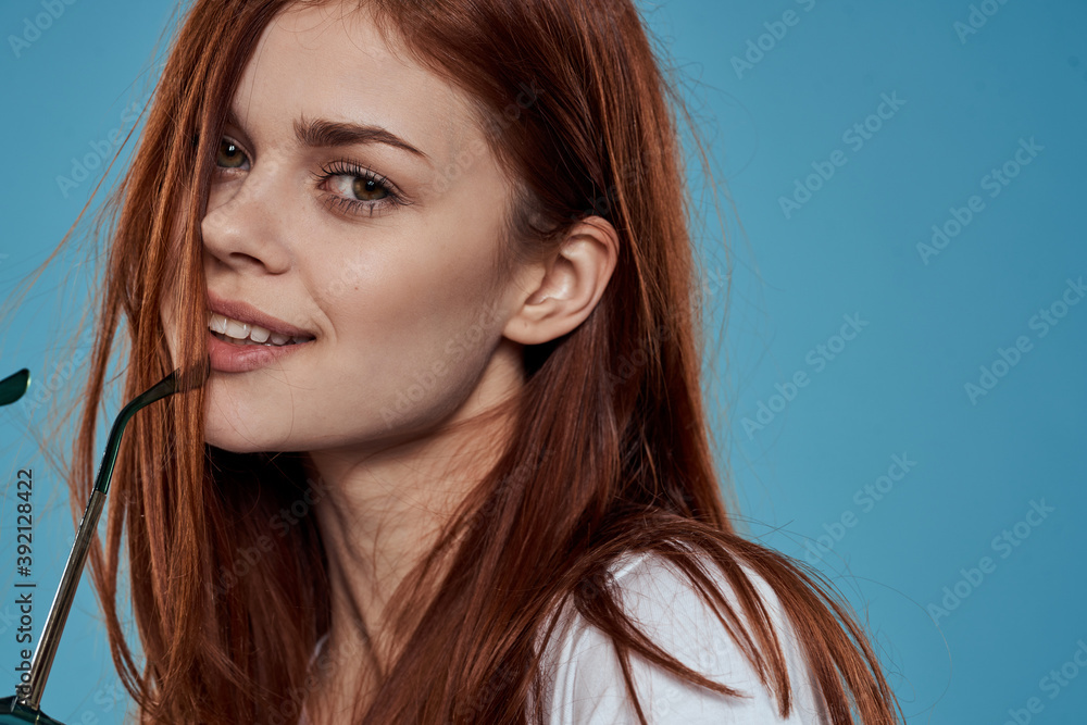 Pretty woman with sunglasses in hands lifestyle emotions long hair cosmetics autumn background white t-shirt Pretty woman with sunglasses in hands lifestyle emotions long hair cosmetics autumn background white t-shirt