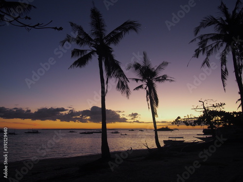 Beautiful sunset with an amazing gradation of color in the sky, Malapascua Island, Daanbantayan, Philippines