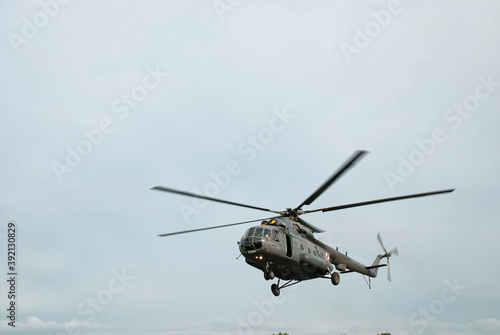 Military helicopter Mi-8 in the air. Photo taken after the parachute jumping show during the Commando Fest in Dziwnów - August 22, 2020. Public show - everyone could photograph without restrictions.