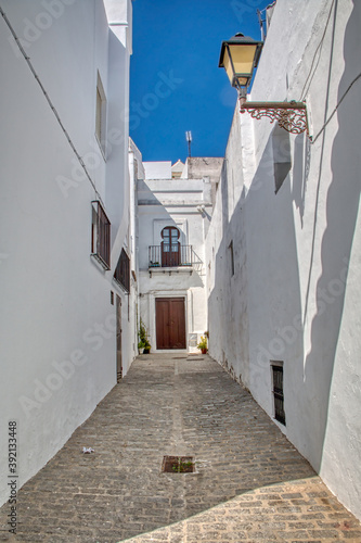 Traditional street in the pretty town of Vejer de la Frontera, Cadiz, Andalusia, Spain