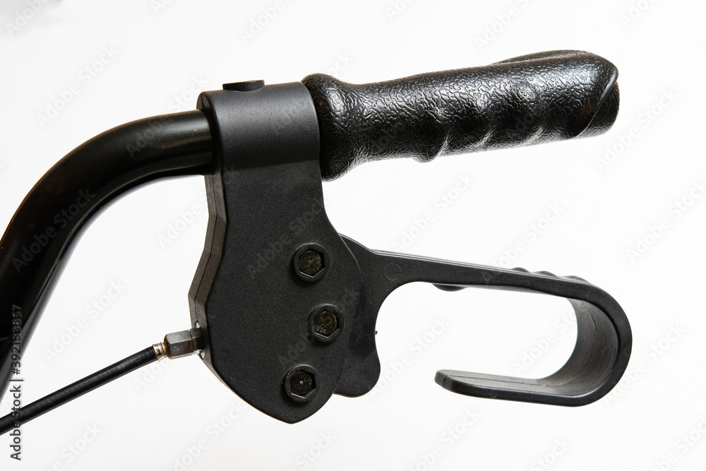 Obraz premium Closeup part of handle and brake of wheelchair support
