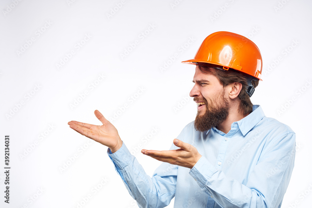 emotional man in work uniform gesturing with his hands an official construction professional emotional man in work uniform gesturing with his hands an official construction professional