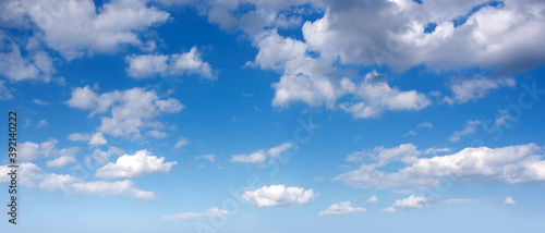Panorama of afternoon blue sky with white clouds. photo