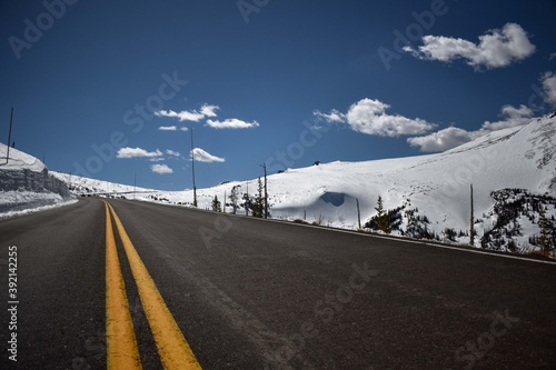 snowy road in the rocky mountains