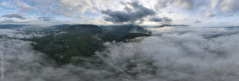 Beautiful Sea of clouds over the mountains landscape during moring sunrise at Mae Hong Son province amazing Thailand. Aerial view panorama with drone.