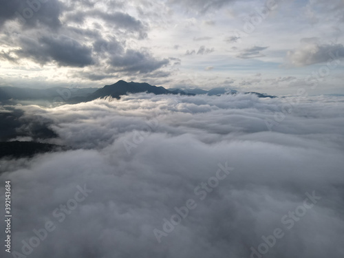 Beautiful Sea of clouds over the mountains landscape during moring sunrise at Mae Hong Son province amazing Thailand. Aerial view with drone.
