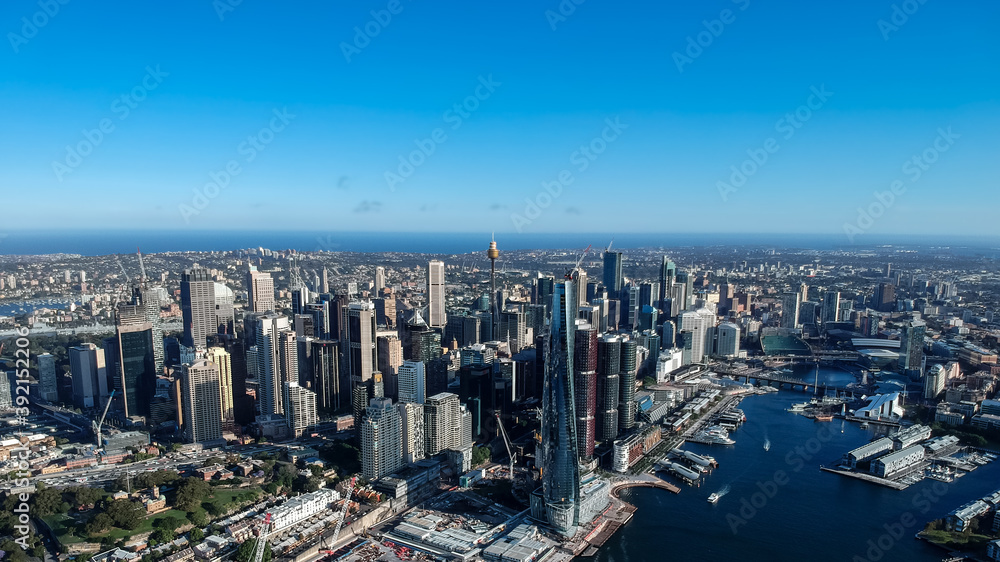 Panoramic Aerial views of Sydney Harbour with the bridge, CBD, North Sydney, Barangaroo, Lavender Bay and boats in view