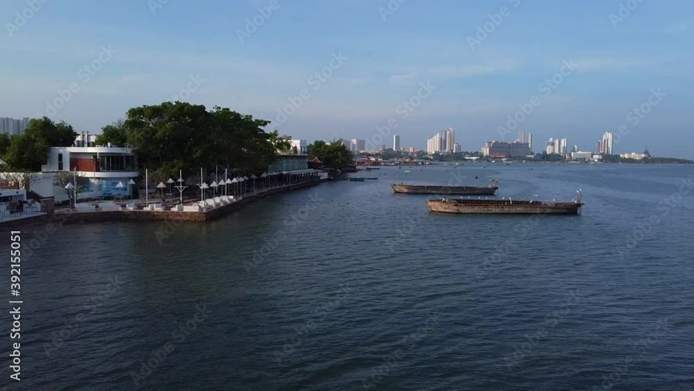 Early morning fly towards wooden skeleton hulls of SE asian boats Early morning fly towards wooden skeleton hulls of SE asian boats