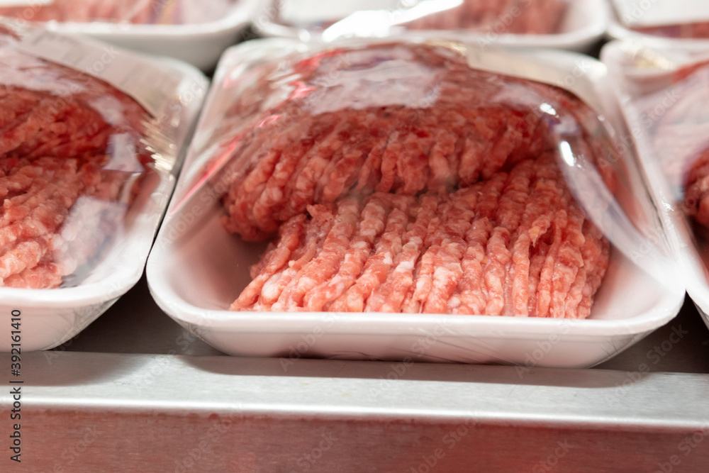 Minced meat in the store close-up. sale of fresh meat in a supermarket Minced meat in the store close-up. sale of fresh meat in a supermarket