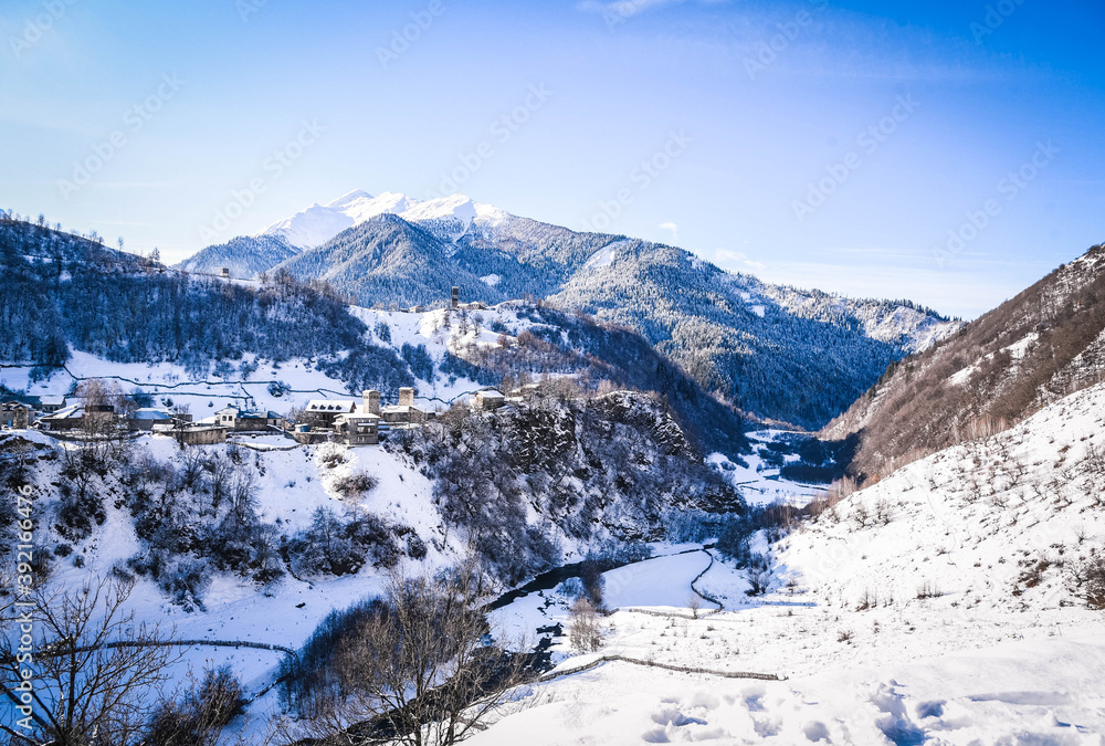 The Caucasus in winter is covered with snow around the village of Ushguli. World heritage village In Georgia