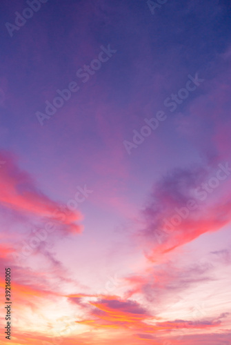 Beautiful picture of a sunset in a partial cloudy day with purple and orange colors. Great dawn