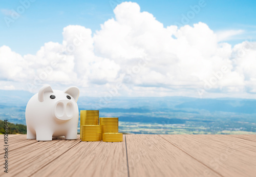 Piggy bank and a pile of coin © enterphoto