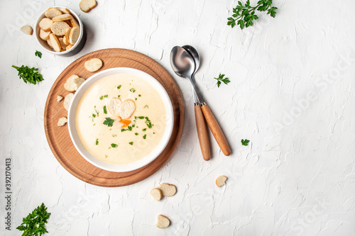 Traditional recipe of Du Barry soup cauliflower on a light background, top view photo