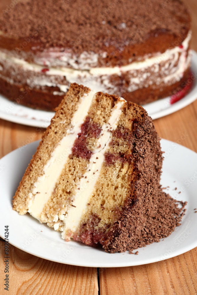 Layer Cake with cream with grated chocolate topping Layer Cake with cream with grated chocolate topping