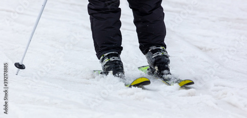 The skier is riding in the snow.