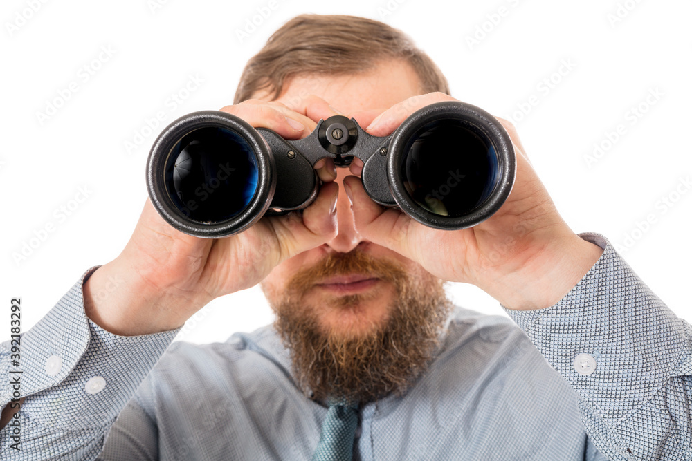 Soilid bearded man in shirt with binoculars Soilid bearded man in shirt with binoculars
